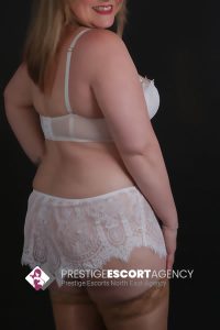 Woman in white lingerie from Prestige Escort Agency