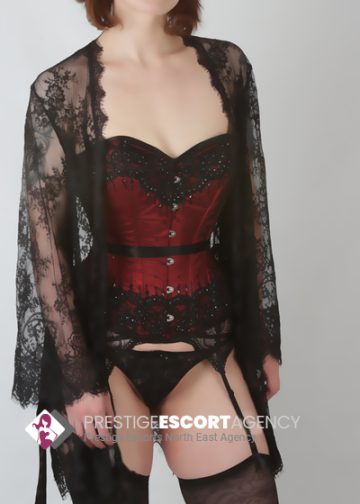 Woman in lace lingerie and corset.