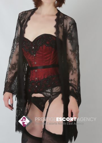 Woman in lingerie with lace robe.