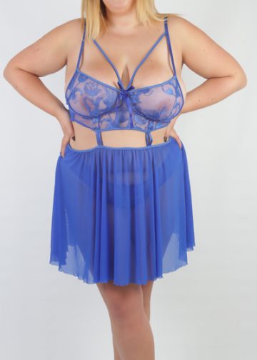 Woman modelling blue lingerie dress.